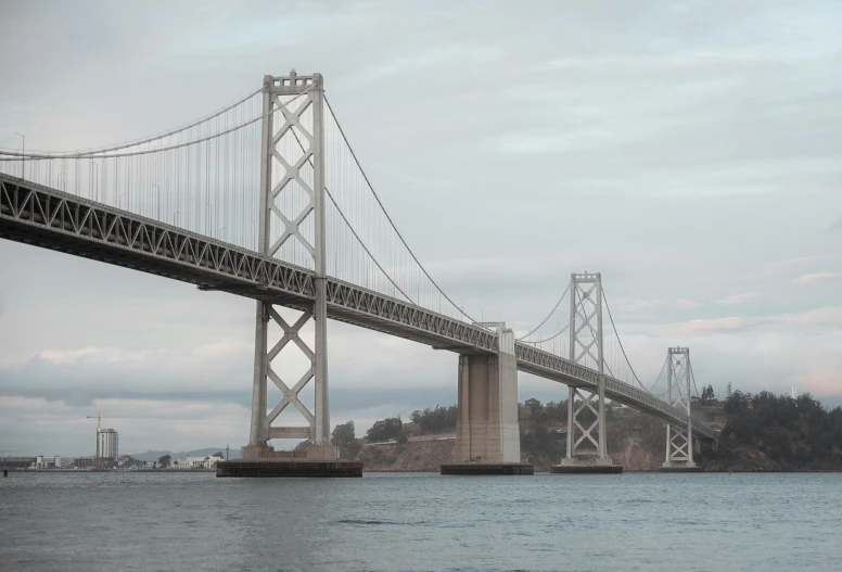 an image of a bridge going over water