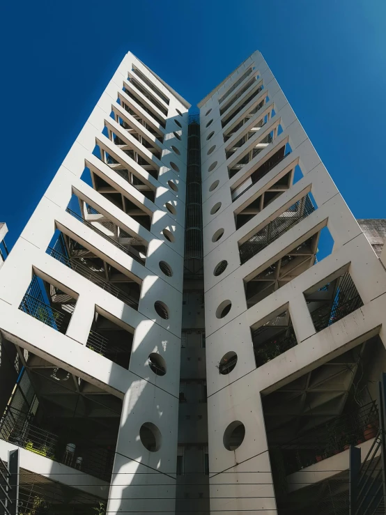 tall buildings with lots of windows against a blue sky