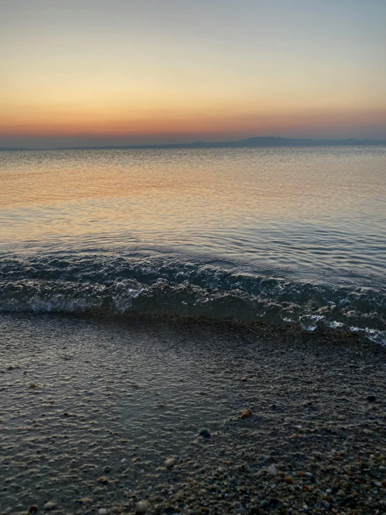 a po of the ocean and the sunset