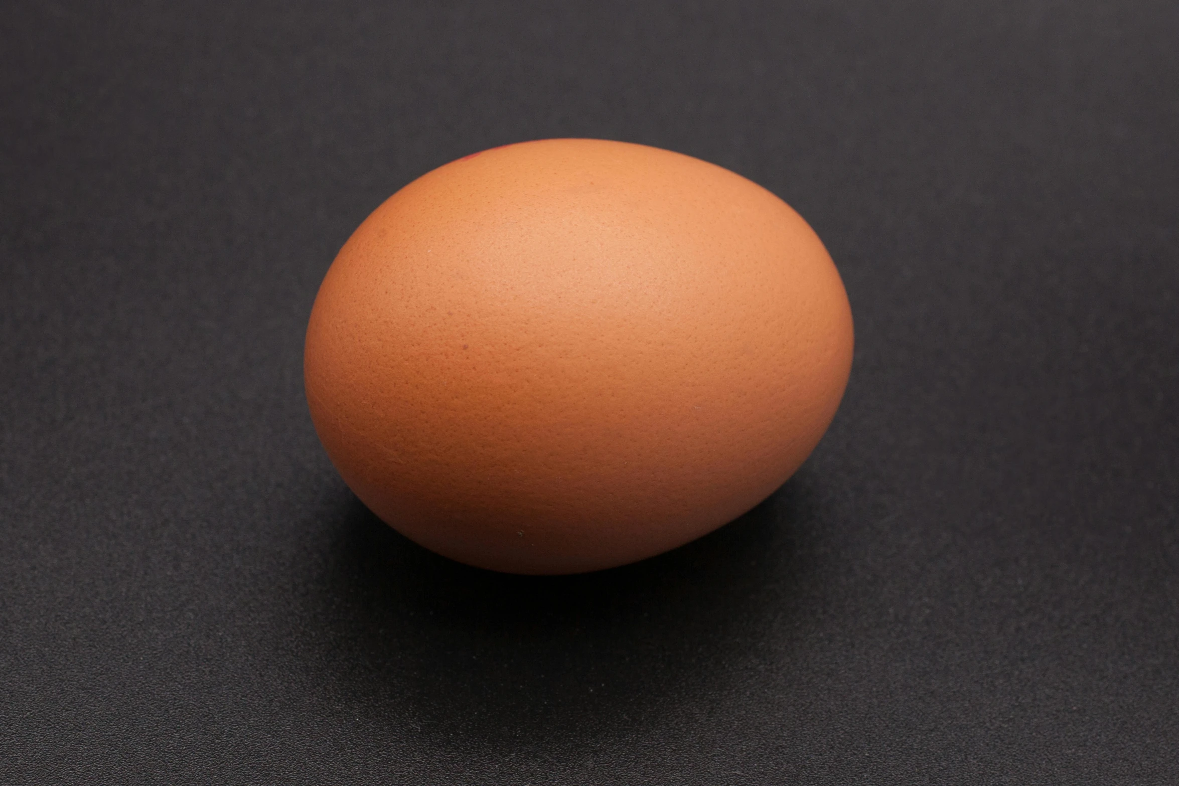 a closeup of an egg on a table