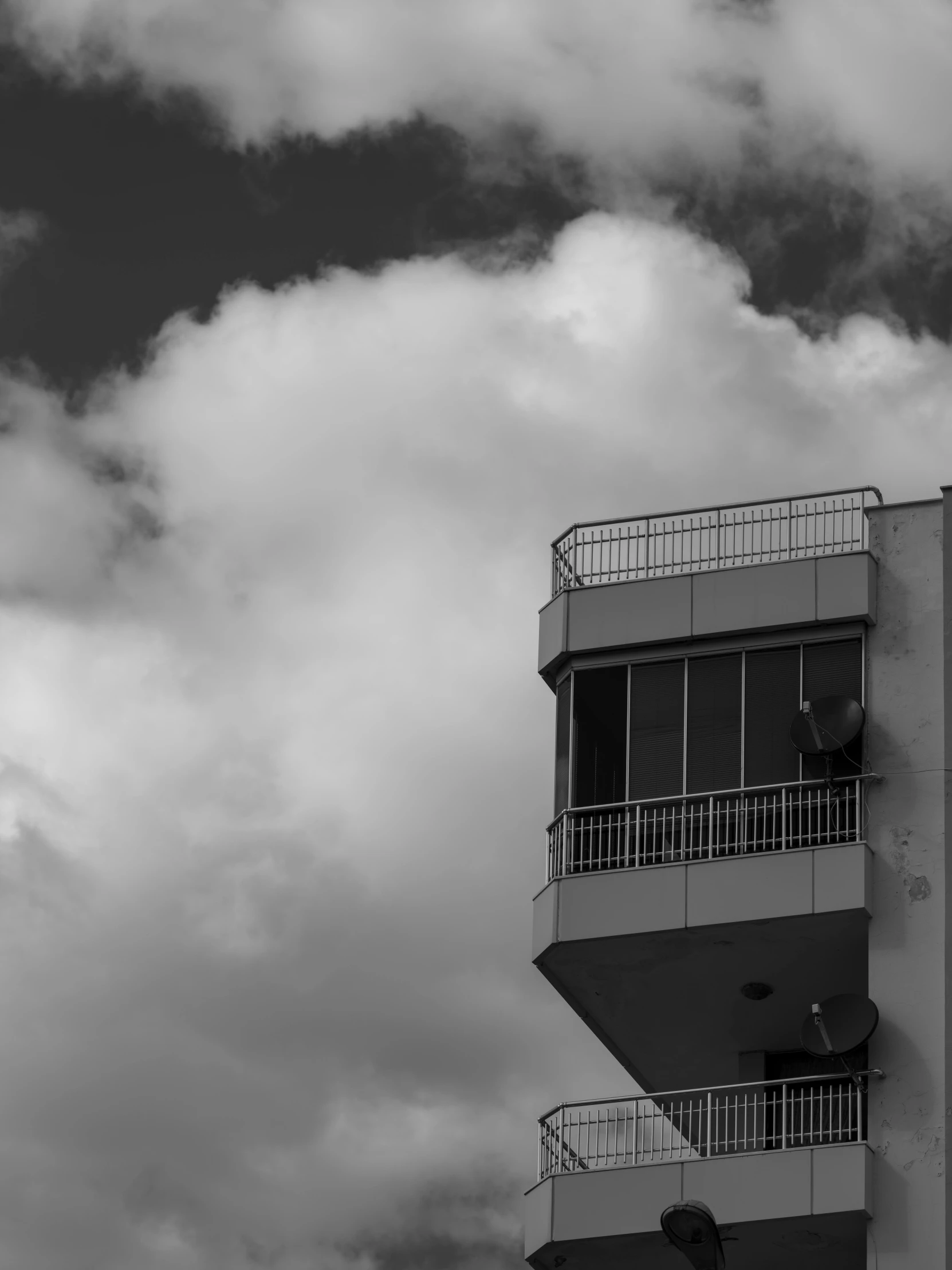 an image of an apartment building with balconies and balconies