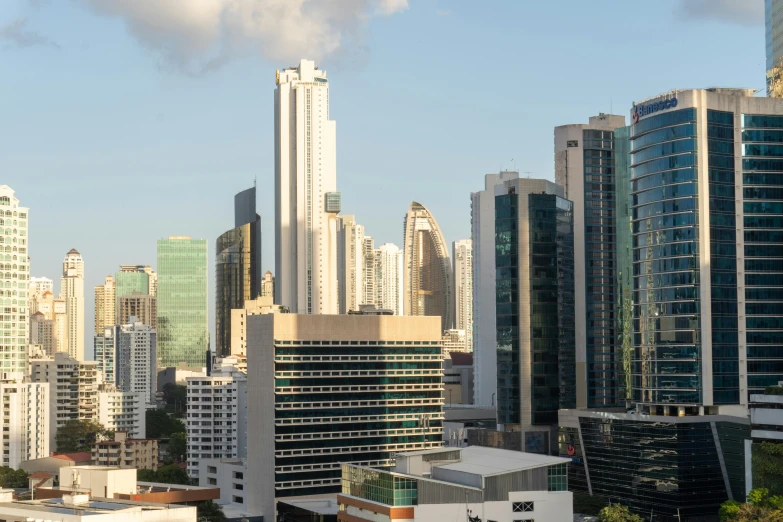 a view of a city in the day with a lot of tall buildings