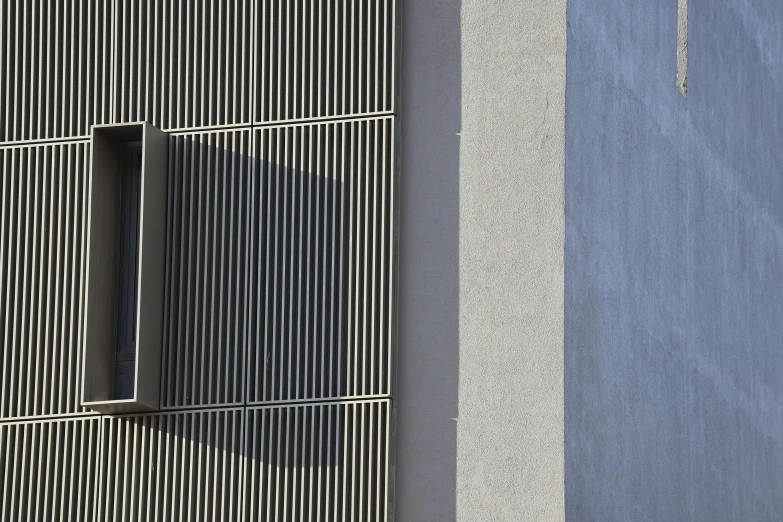 the view from the side of a building shows a window