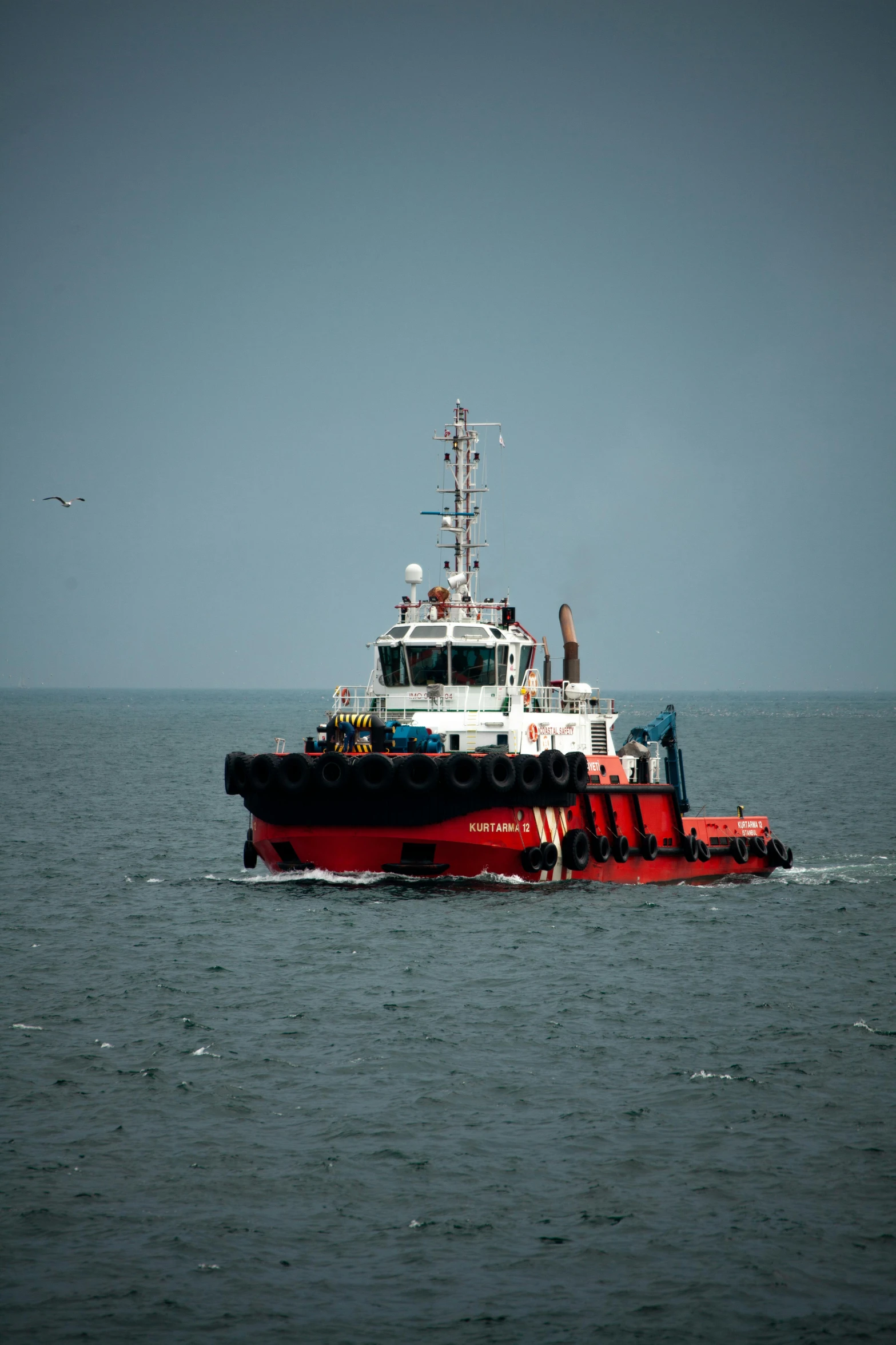 a tugboat traveling across the open water