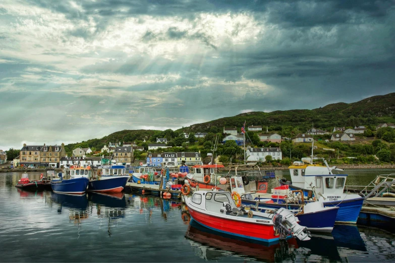 a dock with boats docked in the water