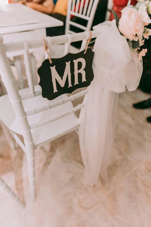 a chair that has some kind of wedding decoration