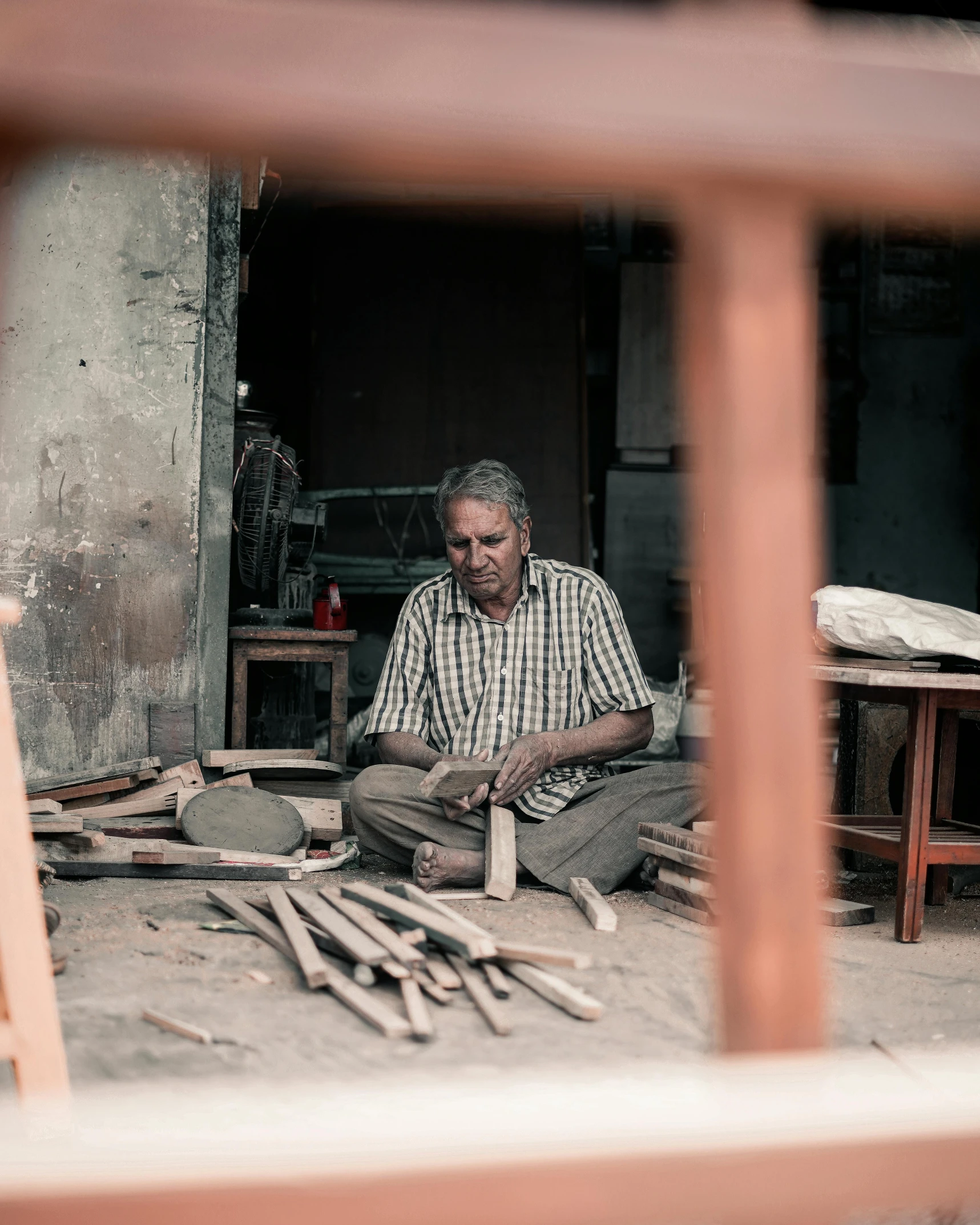 a man  wood in his workshop