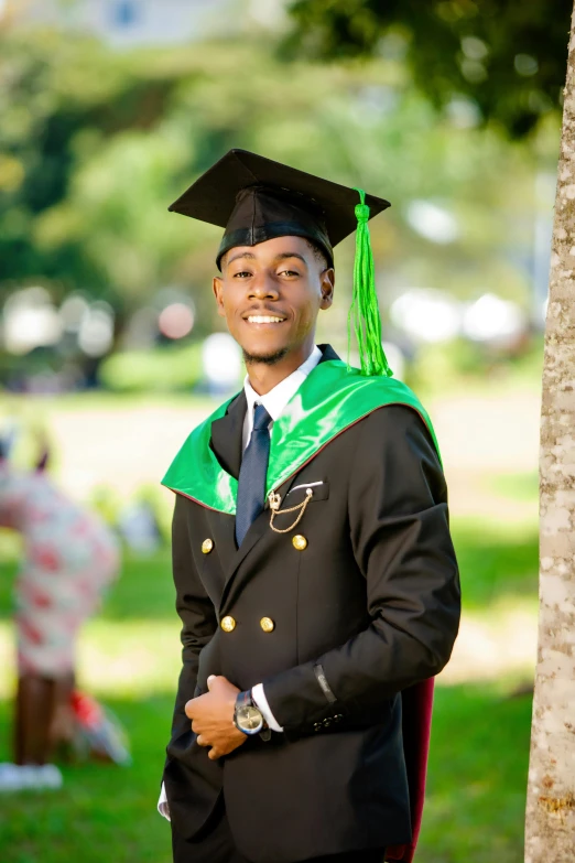 a man in a graduation cap and gown