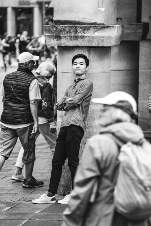 a young man is staring into the distance