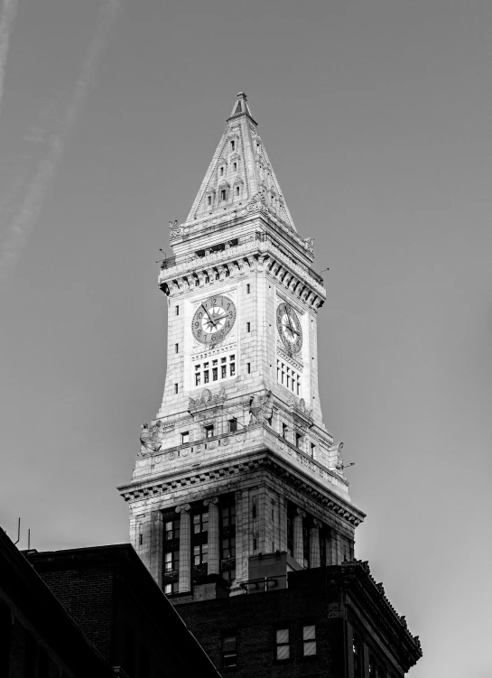 a tall building with a clock on top