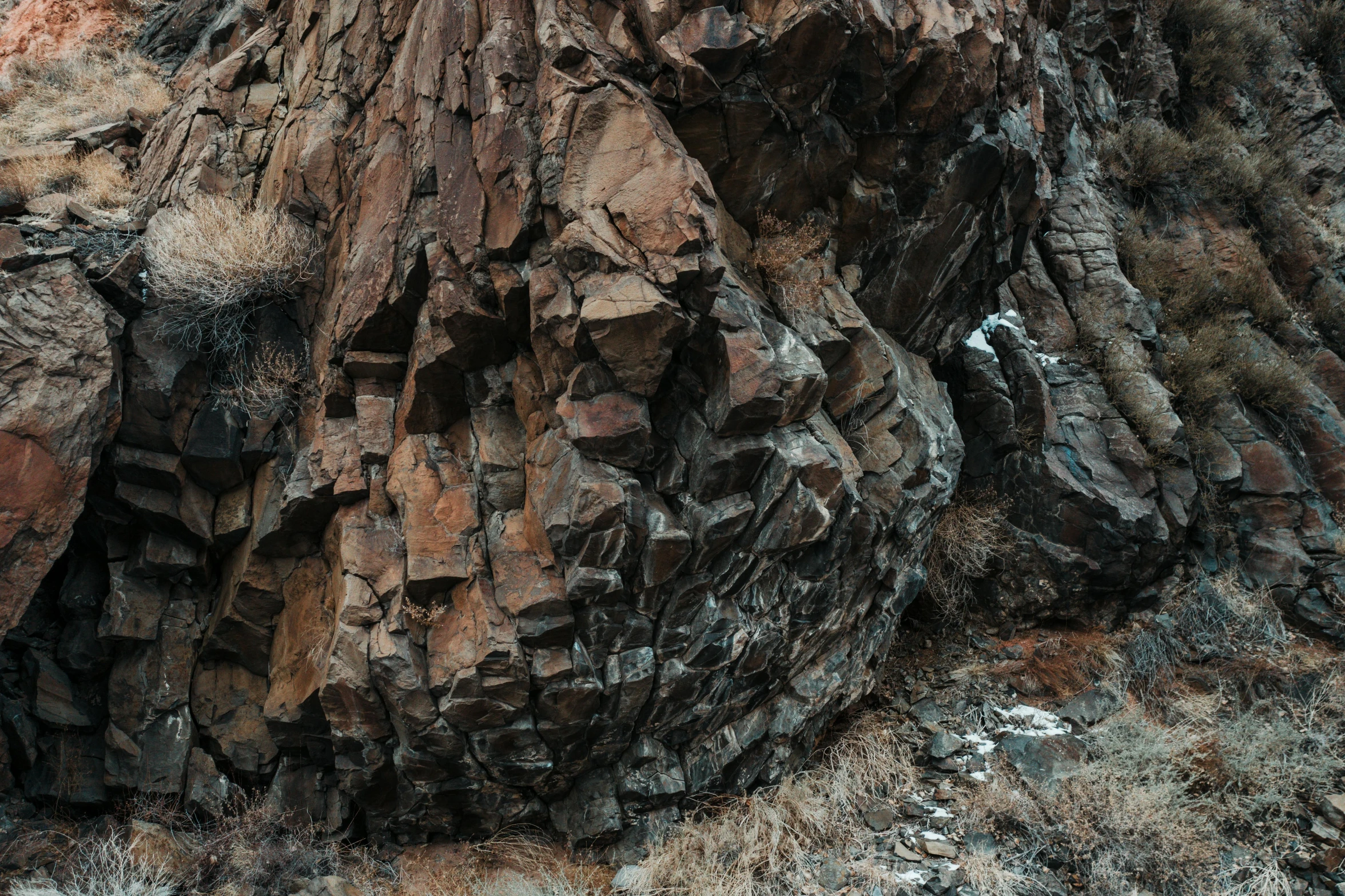 a large pile of rocks in the wilderness