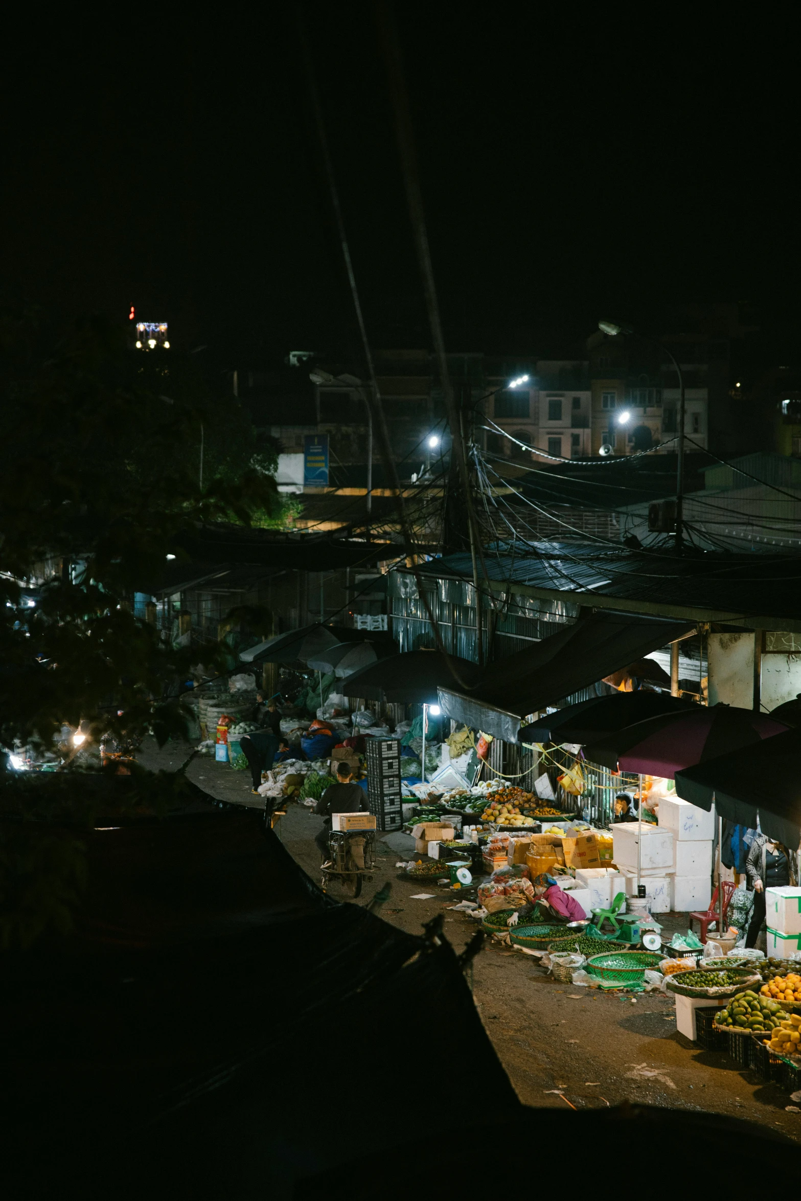 the night market has overloaded fruits and produce