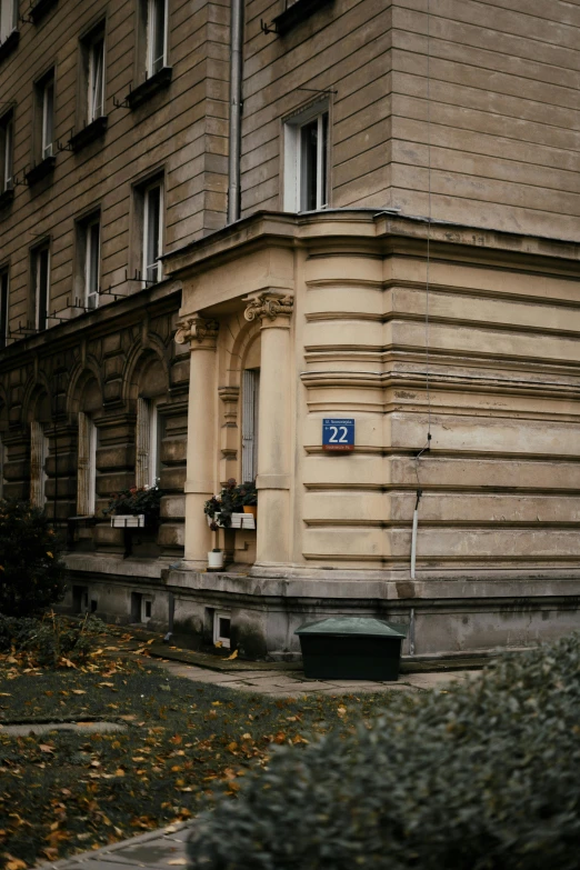 two buildings on the corner of a city street