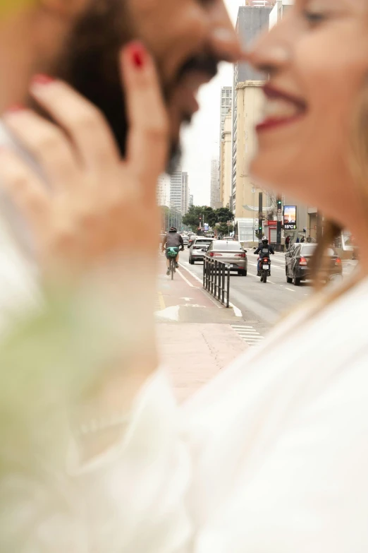 a man and a woman laugh while talking on the phone