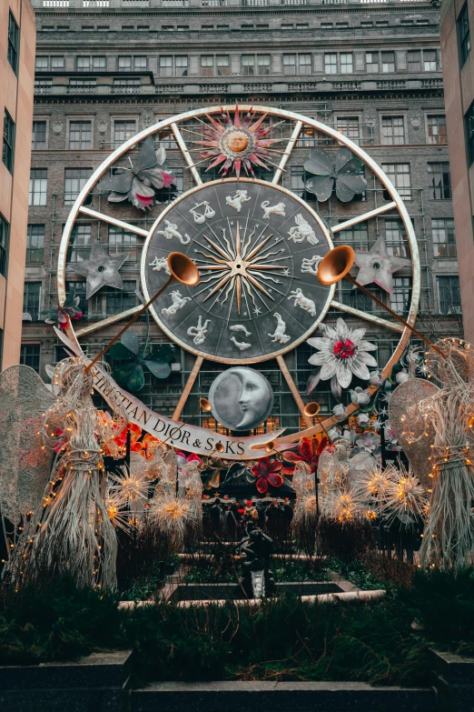 an upside down clock surrounded by holiday lights