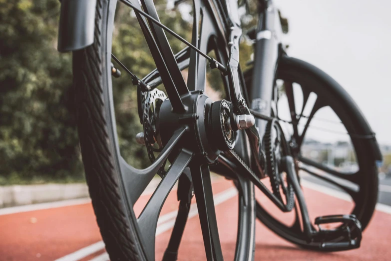 a bicycle parked in front of a bike tire