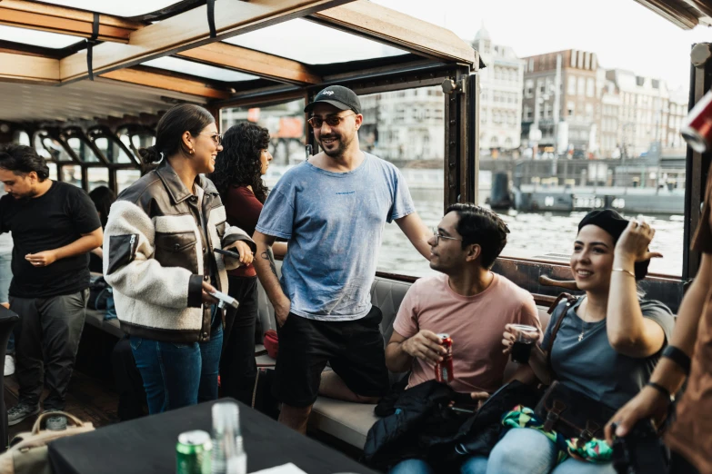 a group of people on a boat that is out in the water