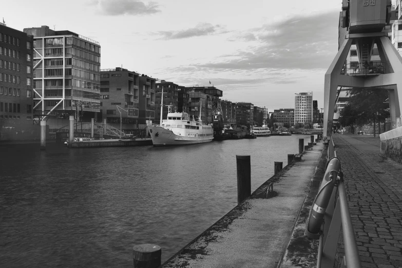 black and white po of a harbor with boats