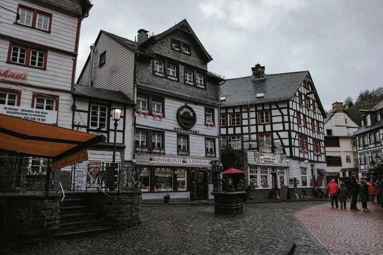 buildings with a sky background next to an open street