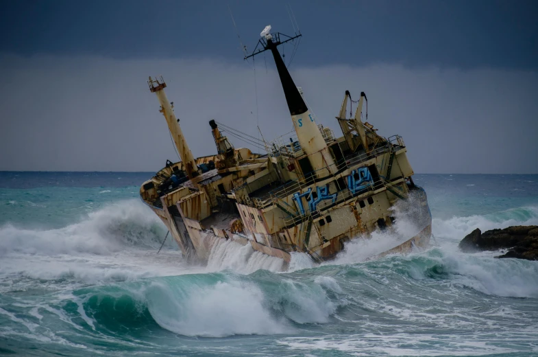 a boat in the middle of the ocean with the waves crashing