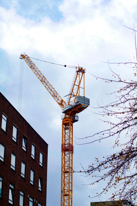 a crane on the top of some buildings