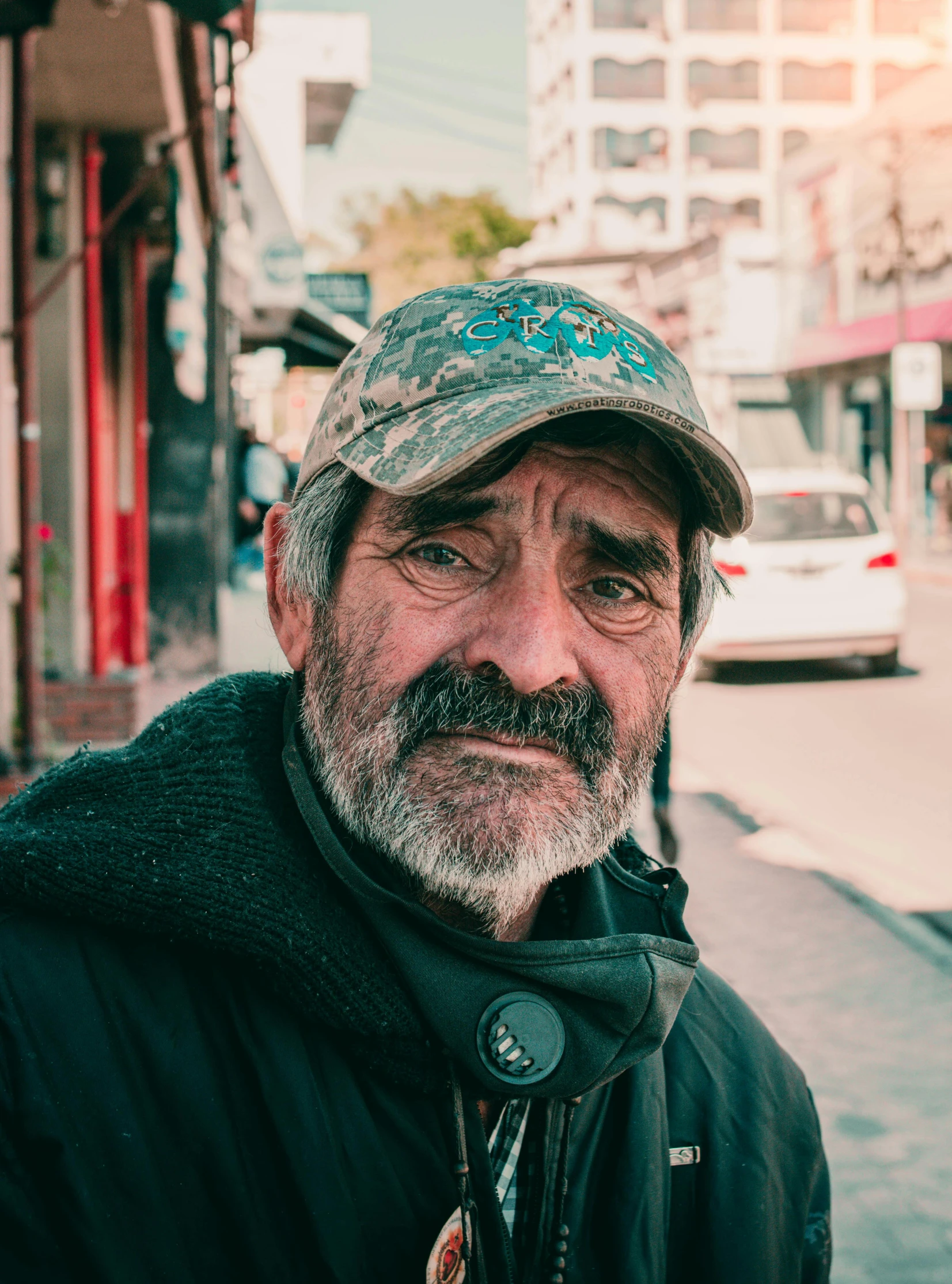 an older man looking towards the camera