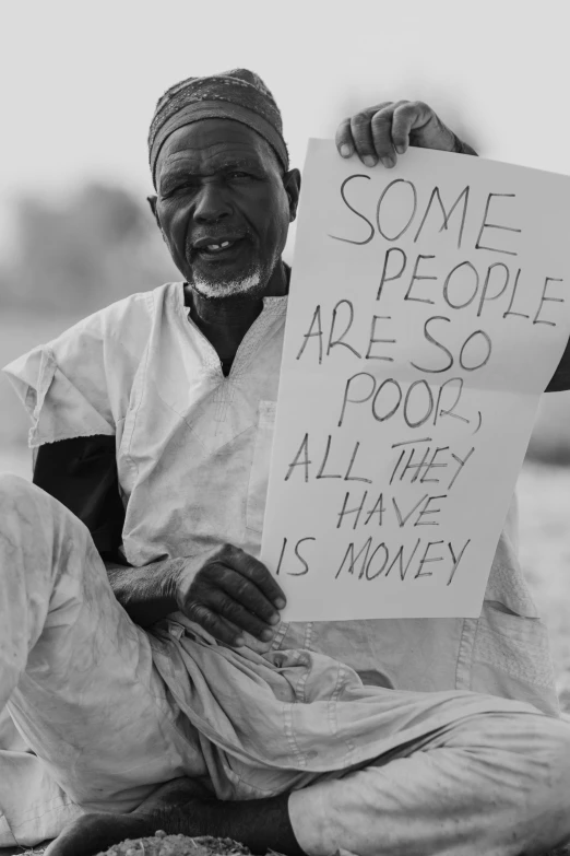 a man is holding up some signs