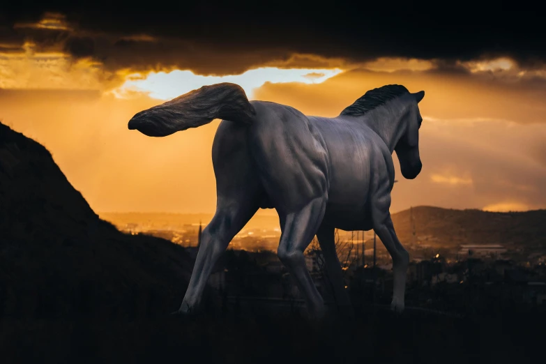 a horse in a dark landscape with the sun setting behind it