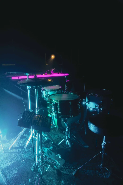 several drums sitting on top of a floor