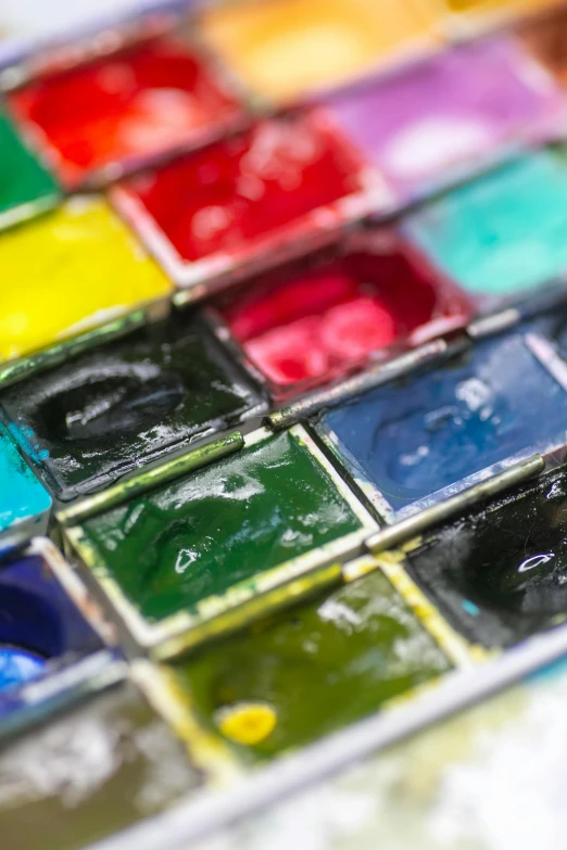 a very nice colorful table with small squares of glass