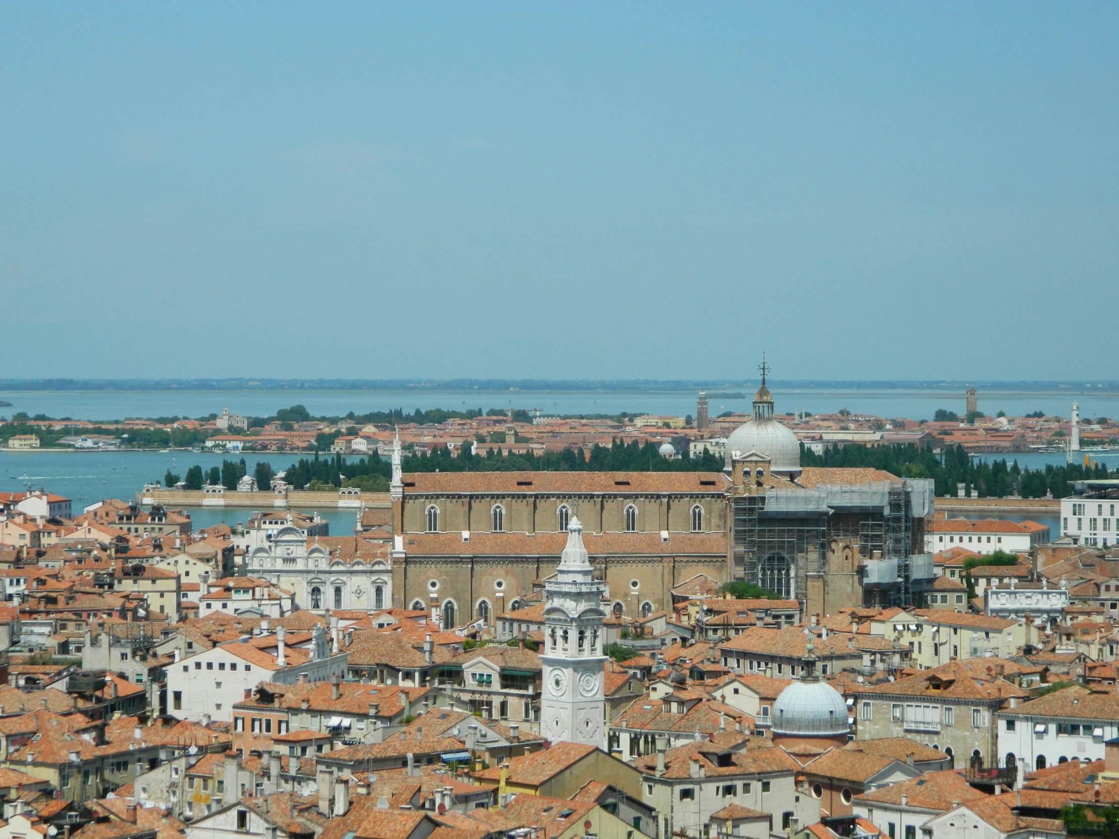 a city with lots of buildings and rooftops