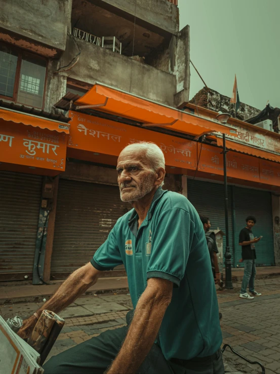 the man is smiling as he stands in front of the store