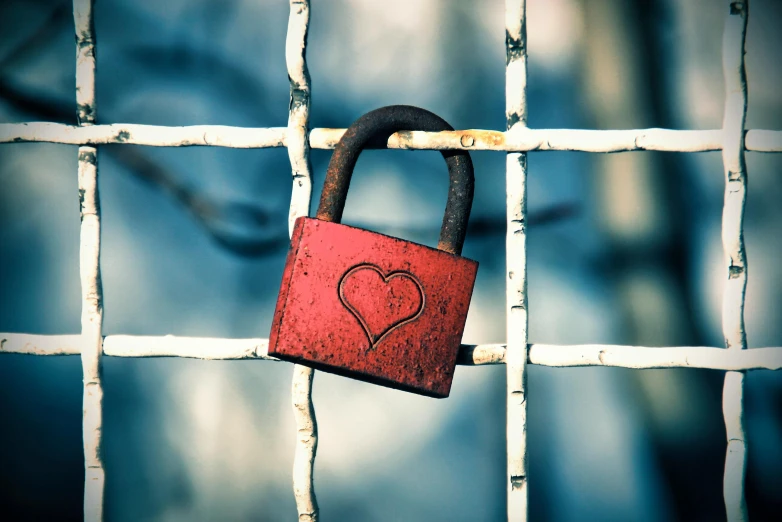 a padlock with a heart shaped shape on it