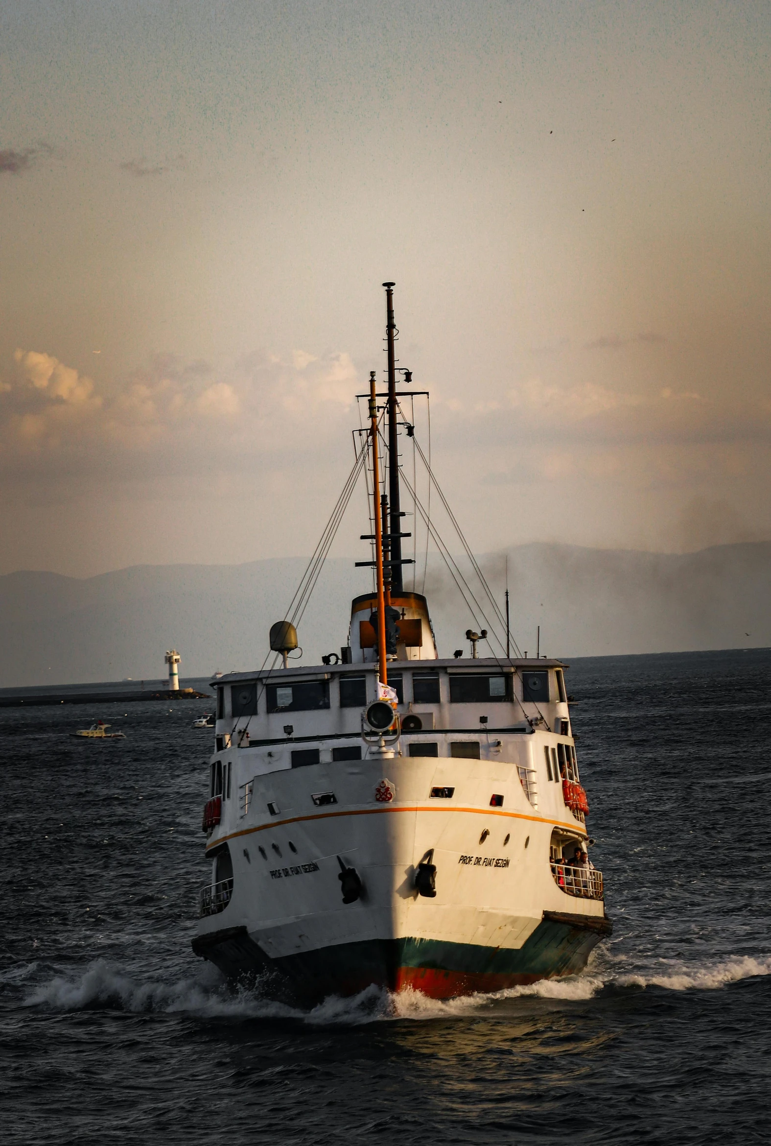 a large white ship on the ocean