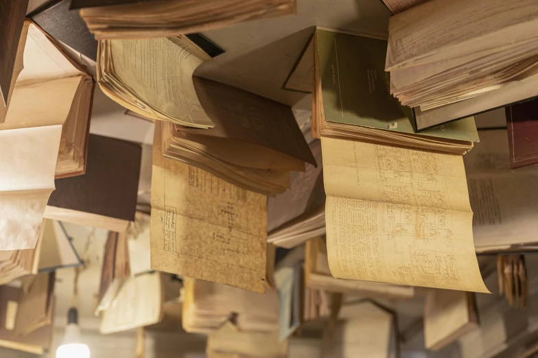 a bunch of books sitting on top of each other