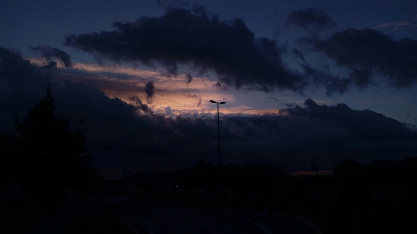 clouds are illuminated by the setting sun