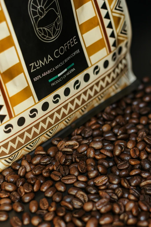 coffee beans and a bag of zma coffee