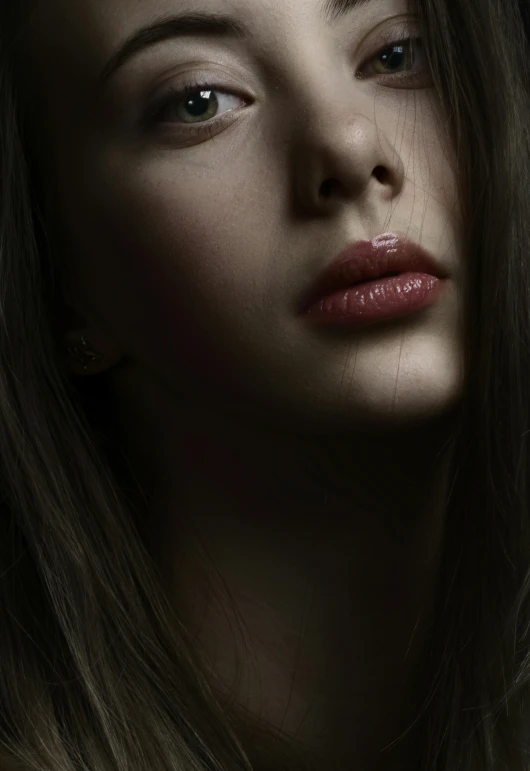 an image of a woman in a studio setting