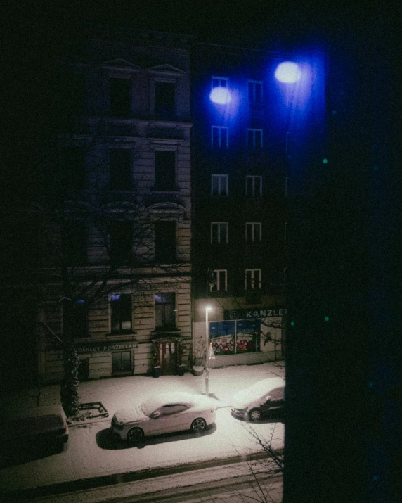 a car driving on the street at night