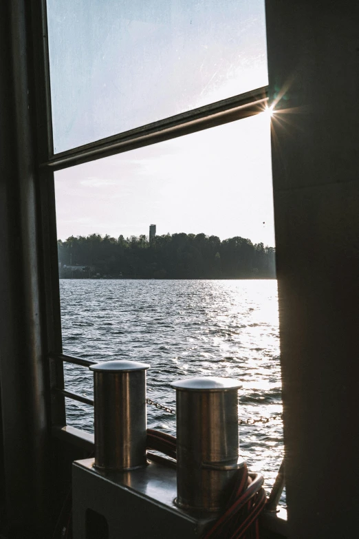 looking out at some blue water from a window