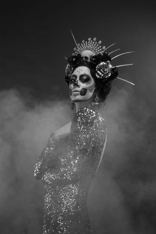 woman with dia de los muerts makeup and skeleton headdress