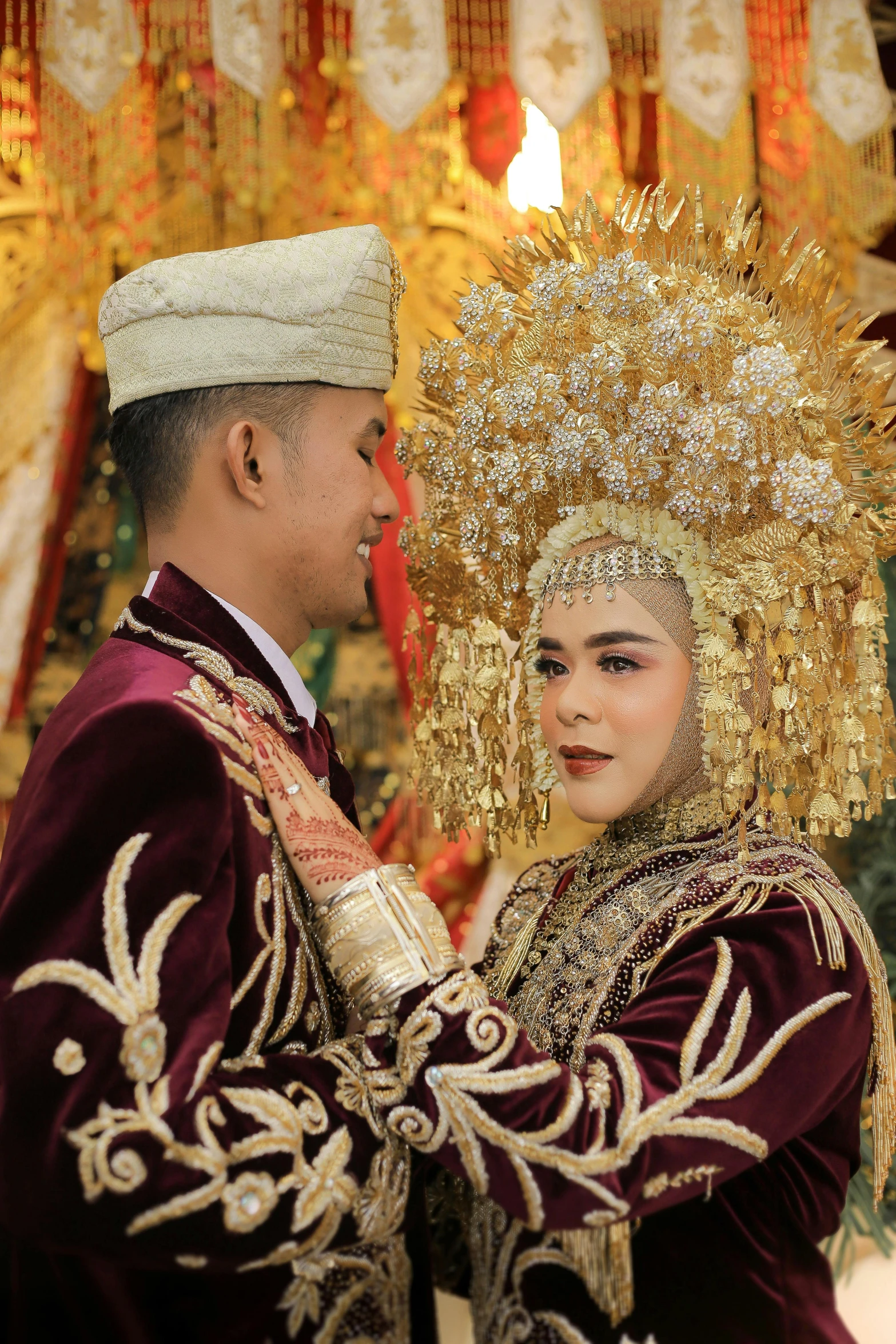 an asian couple dressed in traditional garb dance