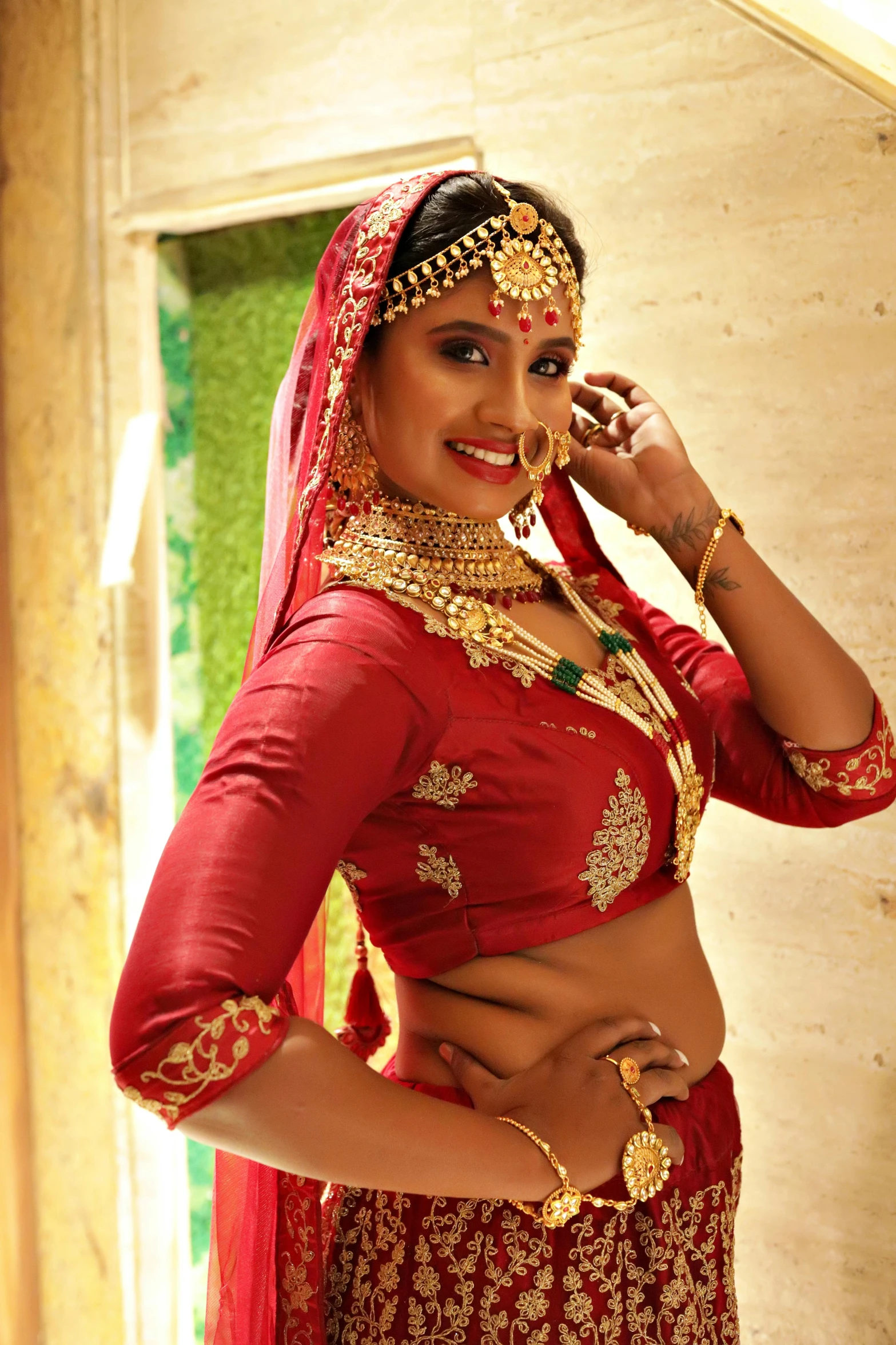 a woman in a bridal dress talking on her cell phone