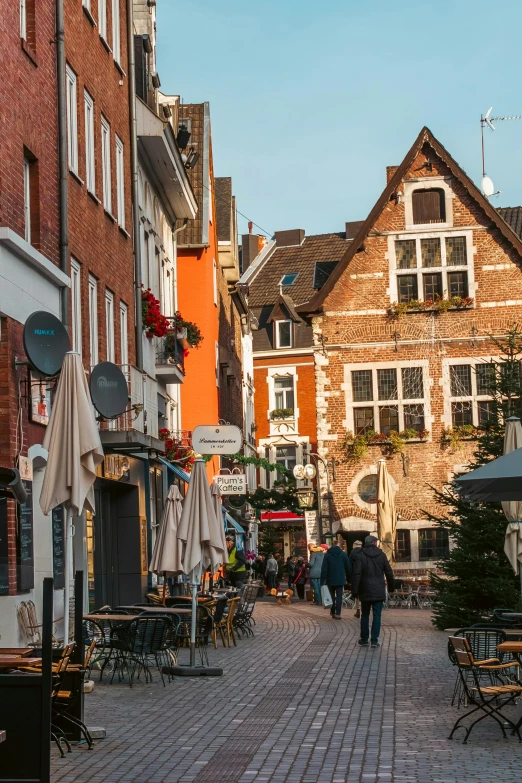 a town has a brick path and buildings