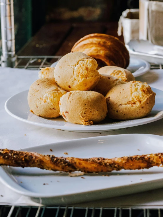 a plate of biscuits sitting on top of a counter