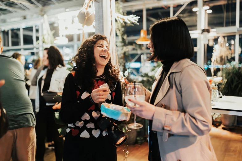 two ladies having conversation in a restaurant