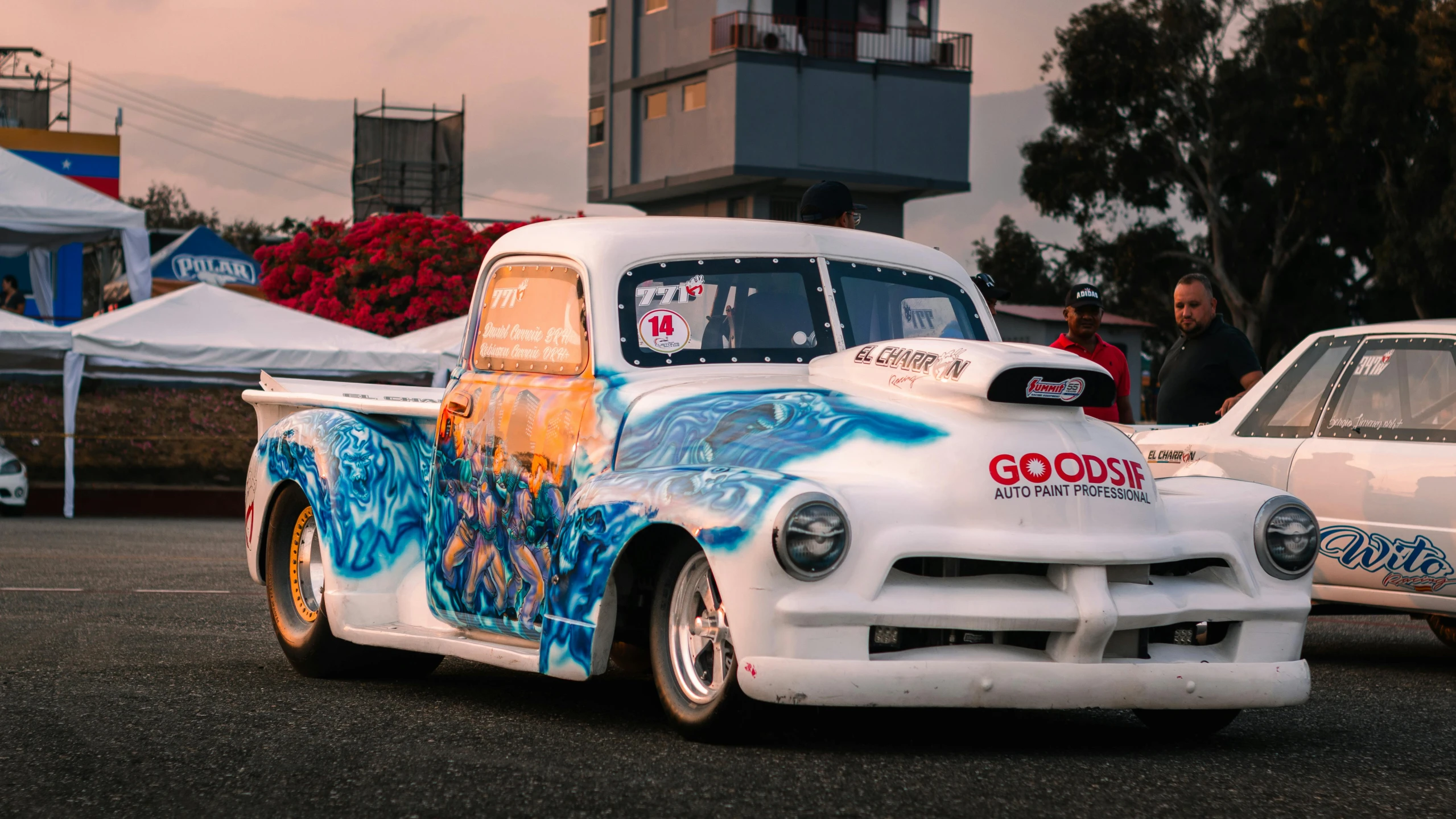 an old style truck with graffiti on it