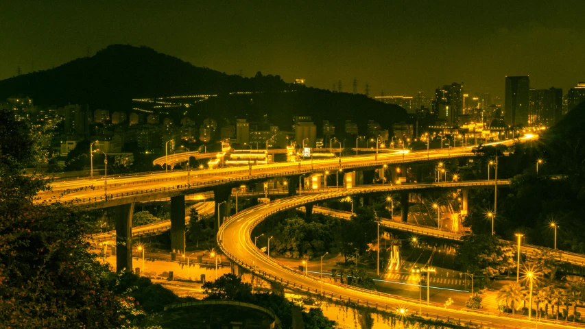 this is a nighttime scene of the street lights in the city