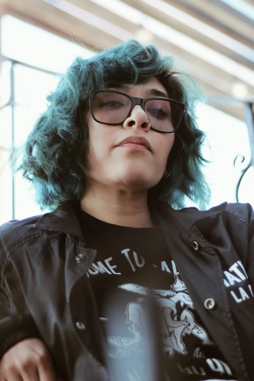 an image of a person with blue hair