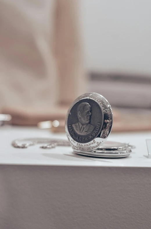 a couple of coin rings sitting on top of a box